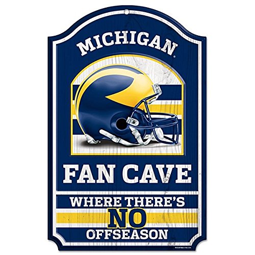 WinCraft Collegiate Fan Shop Authentic NCAA Fan Cave Wooden Sign. Stake Your Territory with This Sign. For the Office or Man Cave. This 11"X17" Sign Let's Everyone Know Your Team