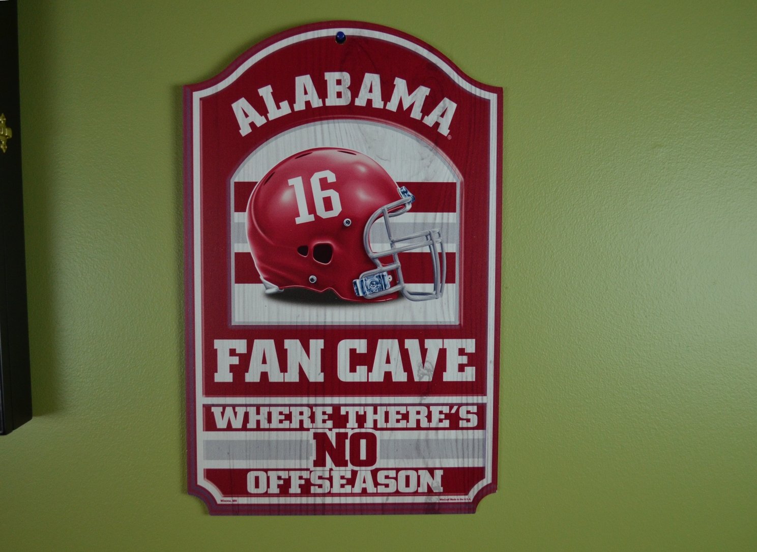 WinCraft Collegiate Fan Shop Authentic NCAA Fan Cave Wooden Sign. Stake Your Territory with This Sign. For the Office or Man Cave. This 11"X17" Sign Let's Everyone Know Your Team